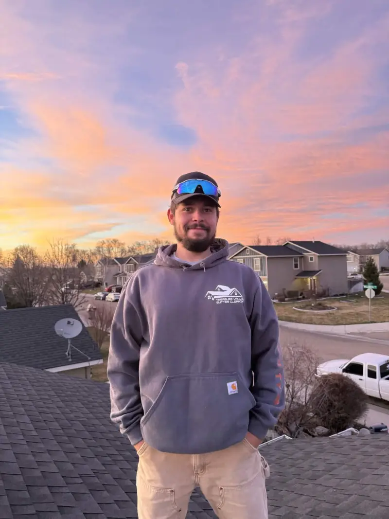 TVGC owner on a roof at sunset